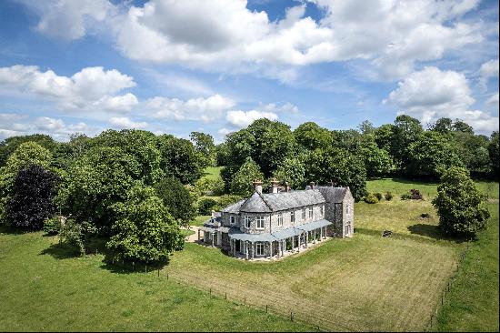 A magnificent Grade II listed Regency country house, fully restored externally, and intern