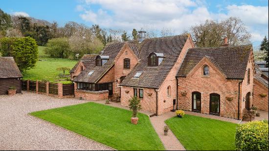 A beautifully presented barn conversion set in at the foot of the Cotswold escarpment.