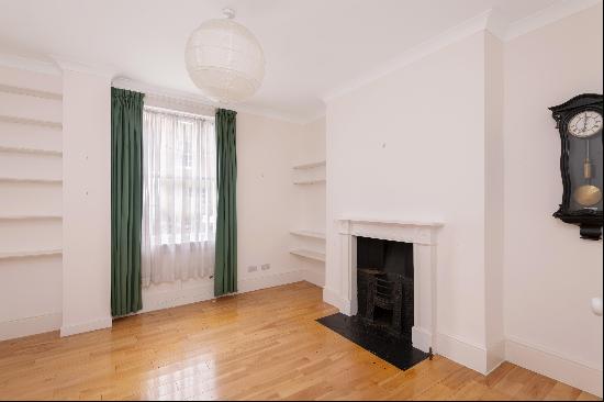 Split level conversion apartment with private garden for sale in W2.