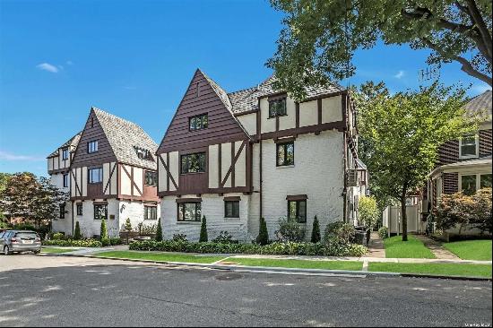 Beautifully Renovated 2-Family Tudor - Prime Location Across from Bowne Park! This beautif