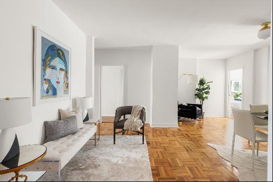 Step into the epitome of refined living just off iconic 5th Avenue, where this elegant 