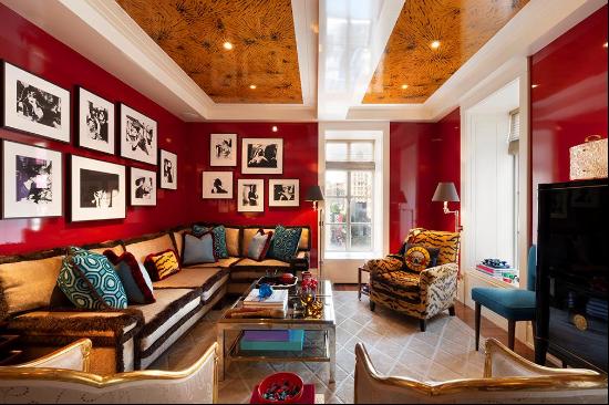 Luscious color and gleaming surfaces turn a city apartment into an alluring jewel box.