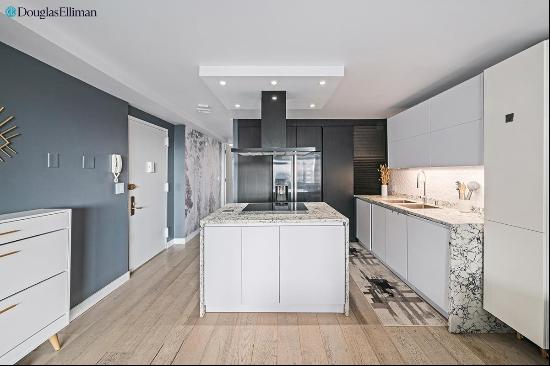 This beautifully renovated, sun-drenched 3-bedroom, 2-bathroom condo is a rare find on 