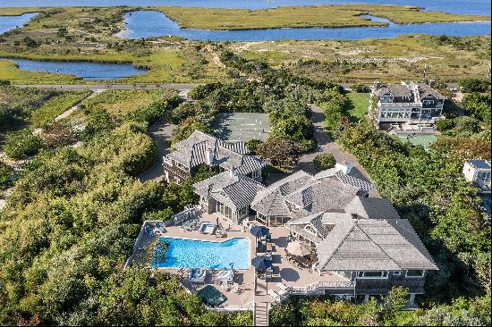 This extraordinary oceanfront home offers the ultimate Hamptons retreat, offering Har-tru 