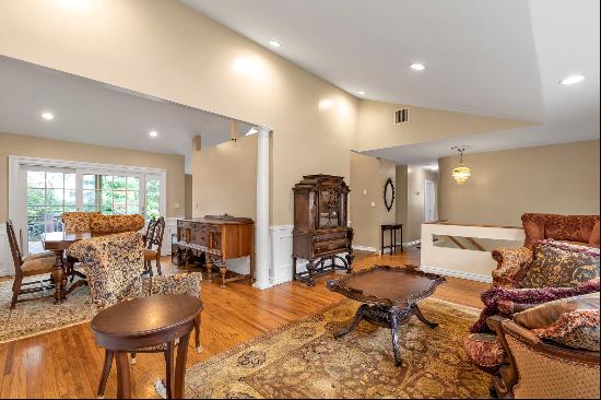 Discover this beautifully updated 4-bedroom, 2.5-bath Hi Ranch with a 2-car garage, ideall