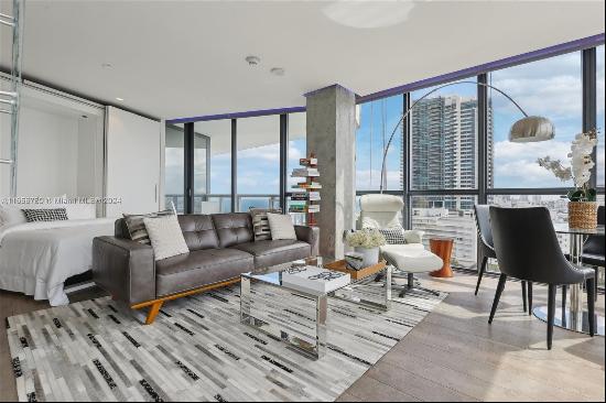 Discover this stunning corner unit boasting a 850 sq ft layout w/ floor-to-ceiling glass w