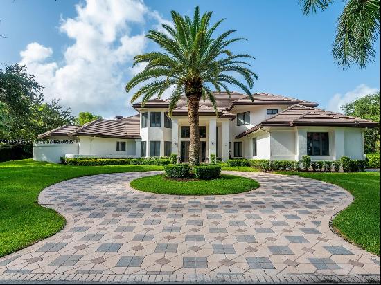 Luxury and privacy in the sought-after Windmill Ranch Estates! This magnificent custom-bui