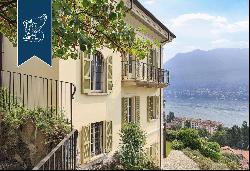 Behind Villa d'Este, a prestigious, finely restored period estate with a park and a lake-v