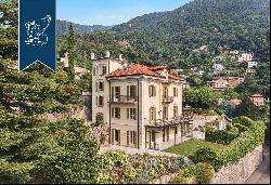 Behind Villa d'Este, a prestigious, finely restored period estate with a park and a lake-v