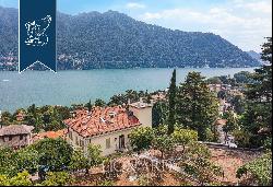 Behind Villa d'Este, a prestigious, finely restored period estate with a park and a lake-v