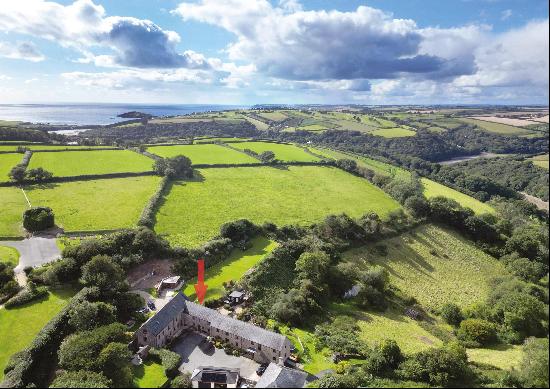 A beautiful stone-built cottage, situated in Bantham, with far-reaching views to Dartmoor.