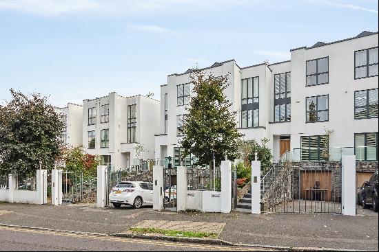 A contemporary five bedroom home with off street parking and south facing garden.