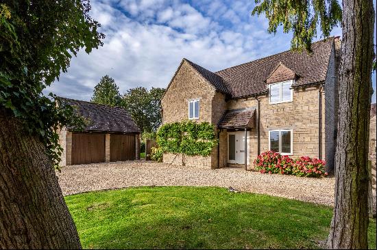 Four bedroom family home in the heart of this picturesque Cotswold village.