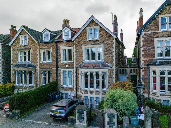 A substantial family home, with off street parking and southwest facing garden, just off W