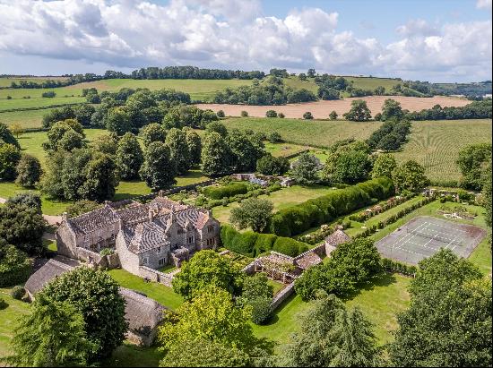 A beautifully situated country estate with an impressive Grade I listed manor house, Dower