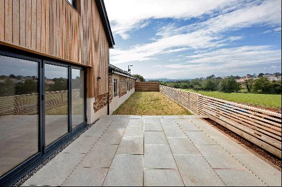 New to the market, this beautiful and recently completed four bedroom barn conversion is p