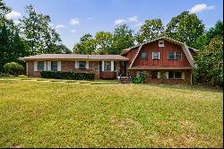 Move-in Ready Residence Nestled on Picturesque 1.2+/- Acre Corner Lot