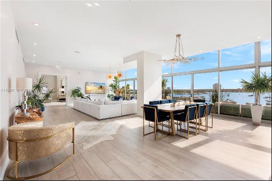 Residence 501, a rare corner unit seamlessly merges indoor & outdoor living with a 68ft lo