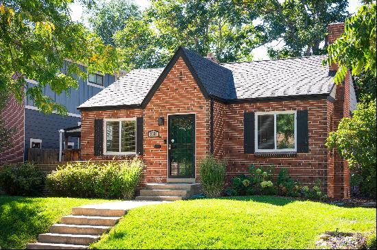 Charming Tudor-Style Home Located on Beautiful Tree-Lined Street