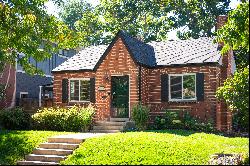 Charming Tudor-Style Home Located on Beautiful Tree-Lined Street