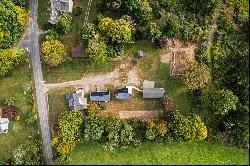 The perfect mix of New England charm & utility in this renovated Farmhouse!