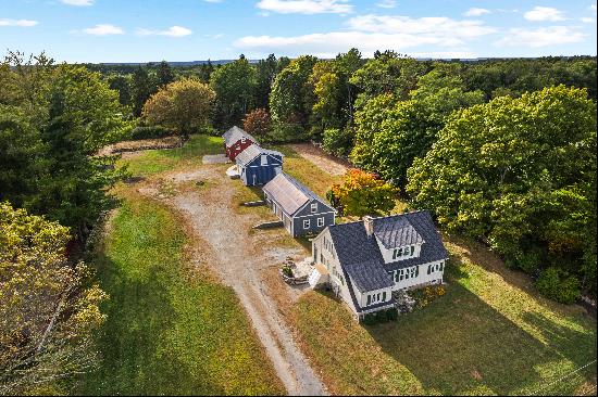 The perfect mix of New England charm & utility in this renovated Farmhouse!