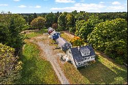 The perfect mix of New England charm & utility in this renovated Farmhouse!