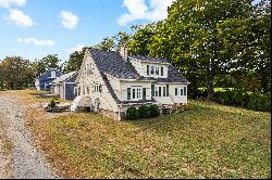 The perfect mix of New England charm & utility in this renovated Farmhouse!