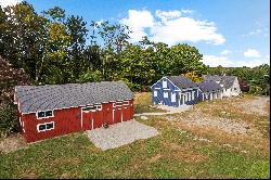 The perfect mix of New England charm & utility in this renovated Farmhouse!