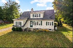 The perfect mix of New England charm & utility in this renovated Farmhouse!