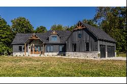 Stunning Custom-Built Ranch On 24+ Acres of Serene Countryside