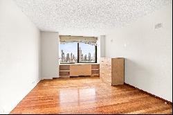 Sprawling, Spacious and Sunny Convertible 3 Bed/2 Bath Condo