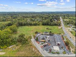 Prime 4.99-acre commercial parcel prominently positioned on Route 164.