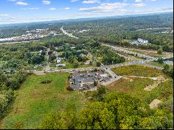 Prime 4.99-acre commercial parcel prominently positioned on Route 164.