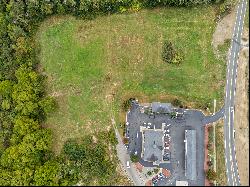 Prime 4.99-acre commercial parcel prominently positioned on Route 164.