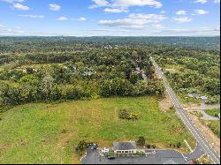 Prime 4.99-acre commercial parcel prominently positioned on Route 164.