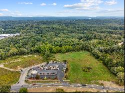 Prime 4.99-acre commercial parcel prominently positioned on Route 164.