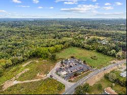 Prime 4.99-acre commercial parcel prominently positioned on Route 164.