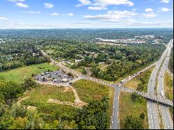 Prime 4.99-acre commercial parcel prominently positioned on Route 164.