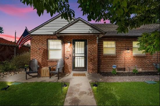 This Refined Residence, a charming brick haven nestled in Denver's Athmar Park