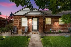 This Refined Residence, a charming brick haven nestled in Denver’s Athmar Park