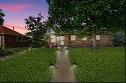 This Refined Residence, a charming brick haven nestled in Denver’s Athmar Park