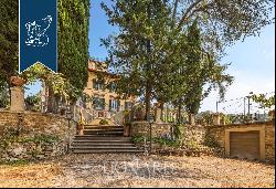 Elegant period villa with a panoramic turret, outbuilding, garden with swimming pool and o