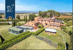 Exclusive relais for sale by Lake Trasimeno, surrounded by vineyards and olive groves