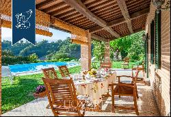 Historic renovated country estate with a swimming pool and olive grove for sale in Urbino