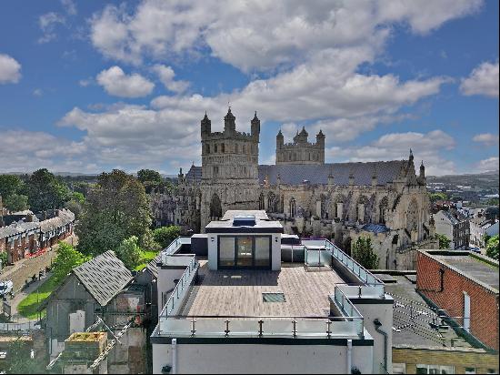 A stunning two-bedroom apartment with a roof terrace and views of Exeter's famous, histori