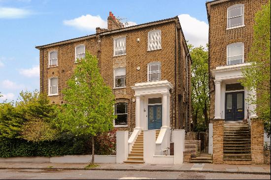 A charming, three bedroom maisonette with a private roof terrace, in a handsome semi-detac