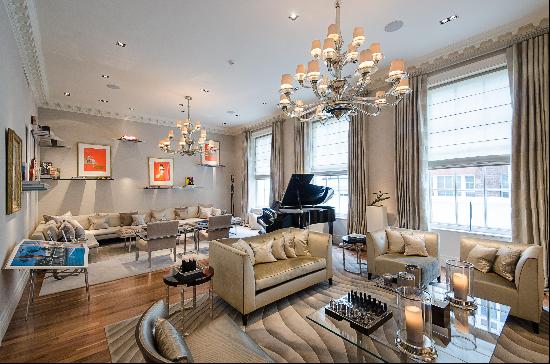 A stunning and grand four bedroom duplex apartment with excellent natural volumes, set in 