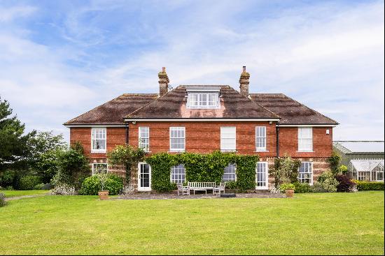 A wonderful country house in a tranquil location that enjoys glorious views over grounds e