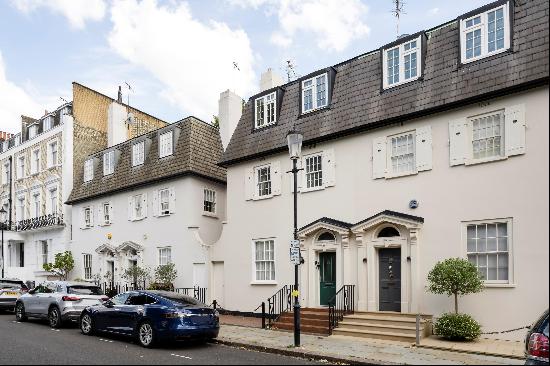 A handsome semi detached villa for sale in Kensington, W8.